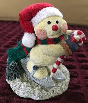 Resin Snowman Skier Figurine: Knitted Hat, Candy Cane Skis, Christmas Decor
